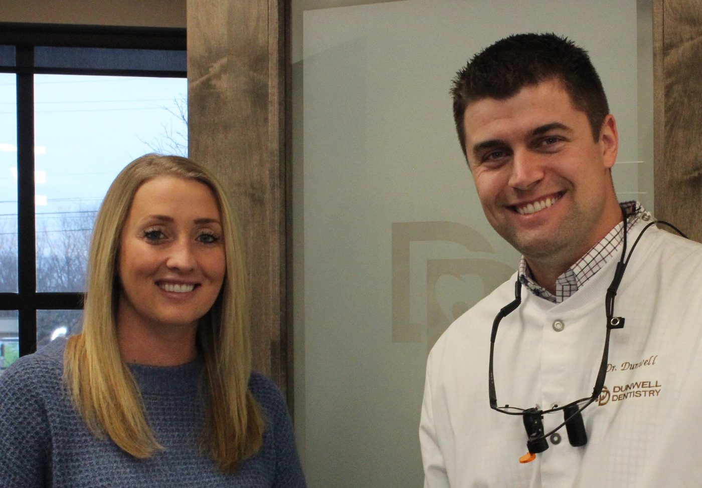 Dr. Dunwell with a member of the Dunwell Dentistry team