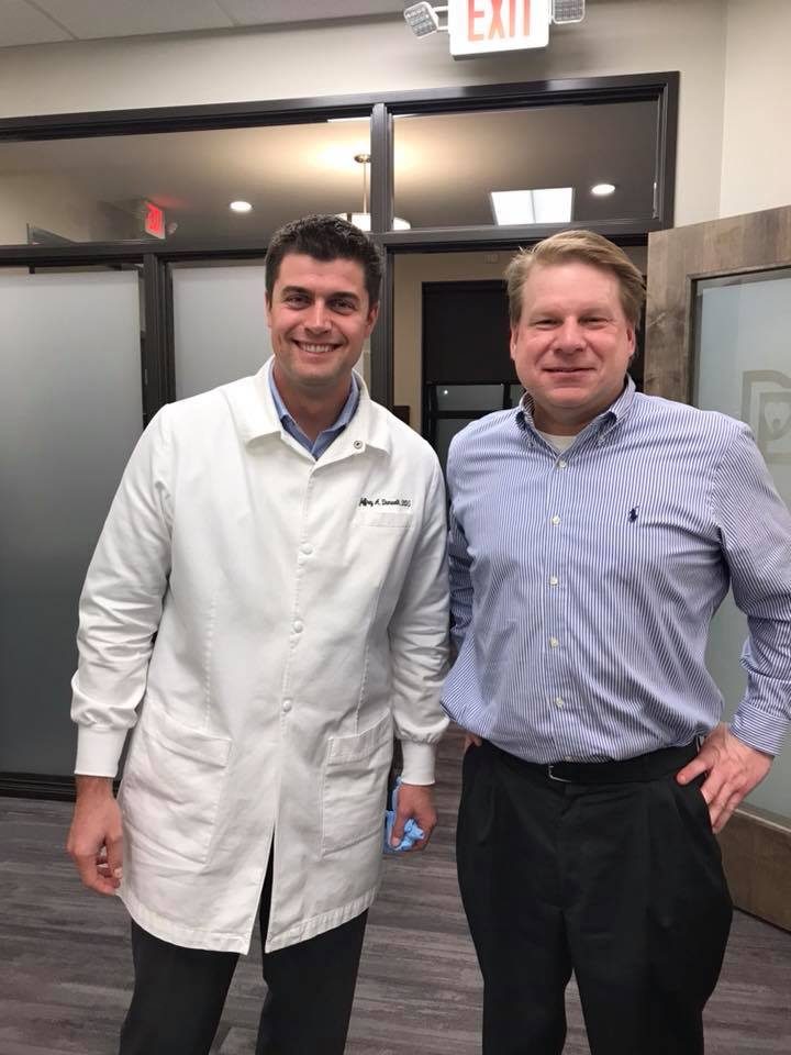 Dr. Dunwell with a patient